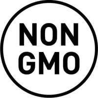 The image features a circular logo with the text "NON GMO" prominently displayed in bold letters. It signifies that a product is not made from genetically modified organisms (GMOs), indicating a preference for natural or traditional agricultural practices.