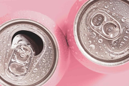 Top of pink soda can with top open