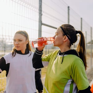 soccer-player-drinking-protein